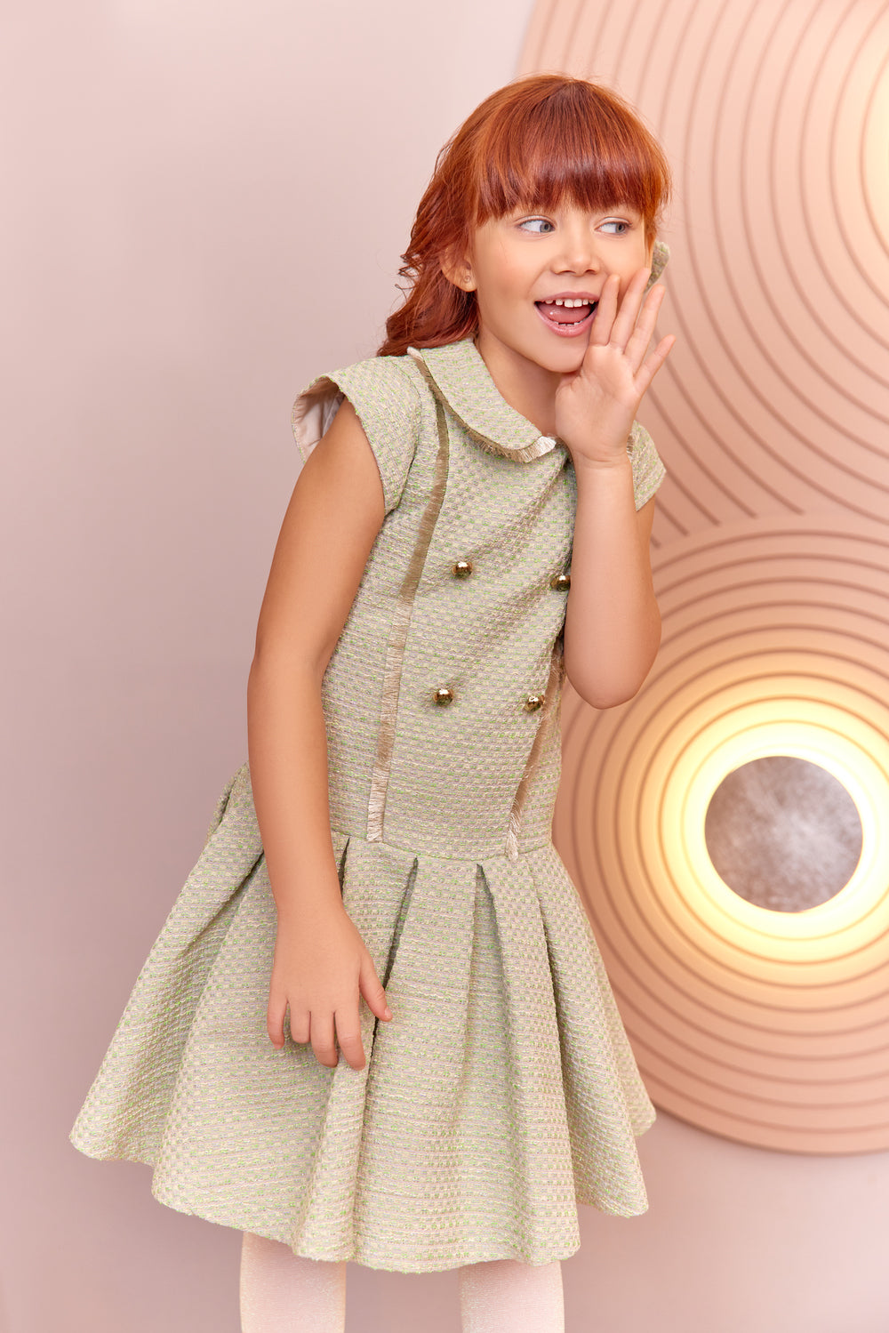 Light green tweed dress with gold fringes and pleated skirt