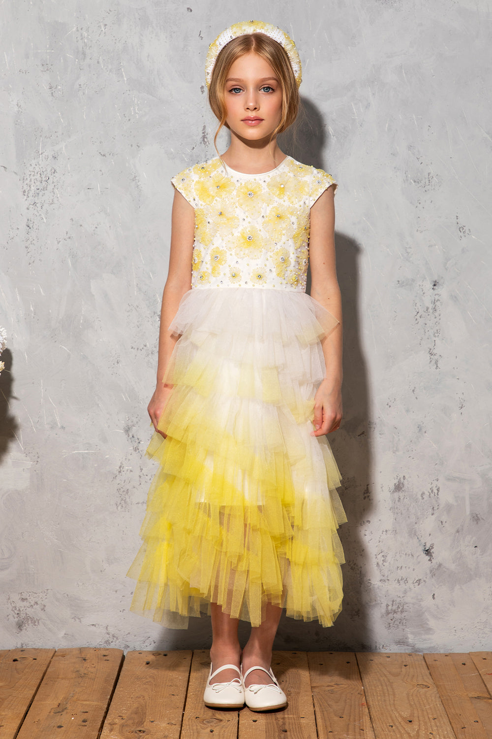 White and yellow ombré layered tulle dress with hand-embellished yellow flower top