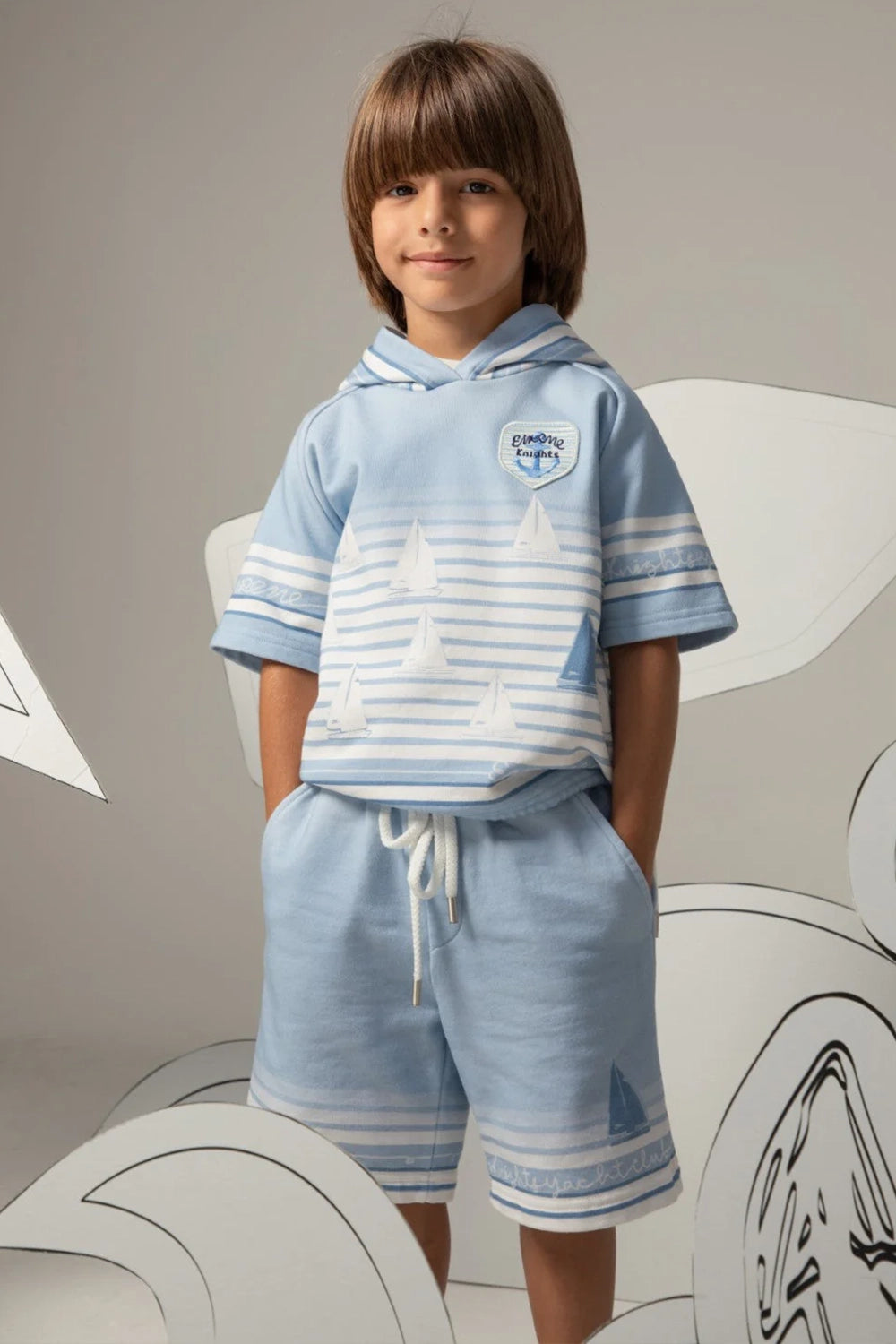 Light blue drawstring shorts with striped print