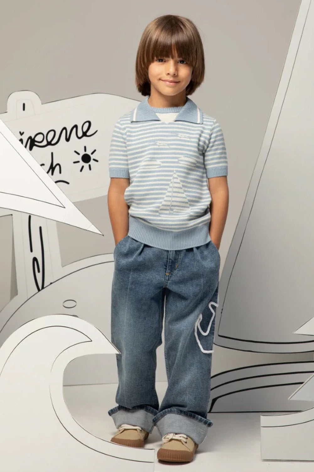 Relaxed-fit denim jeans with cuffed hems and anchor detail on the leg