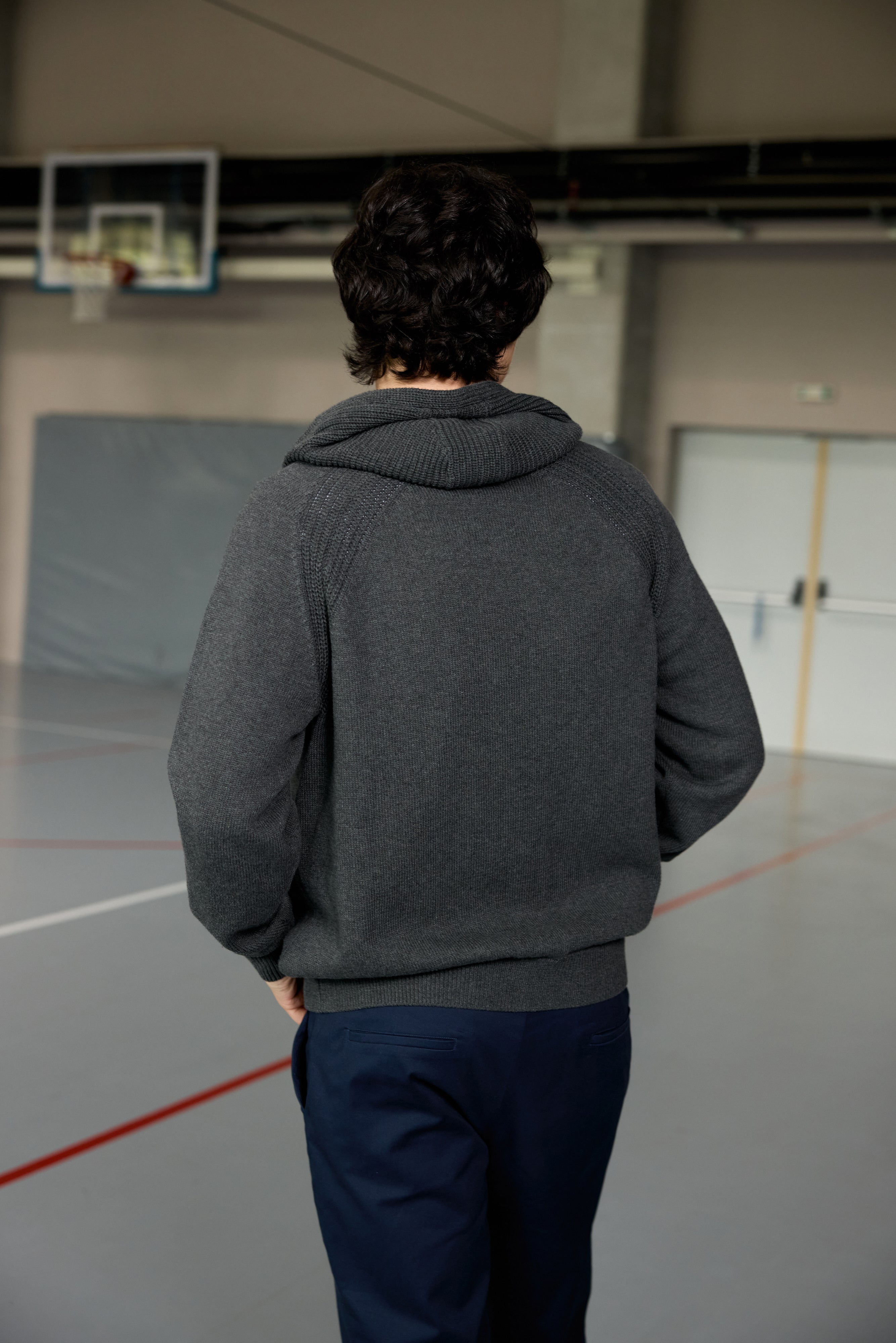 Unisex grey zip-up hoodie with ribbed texture