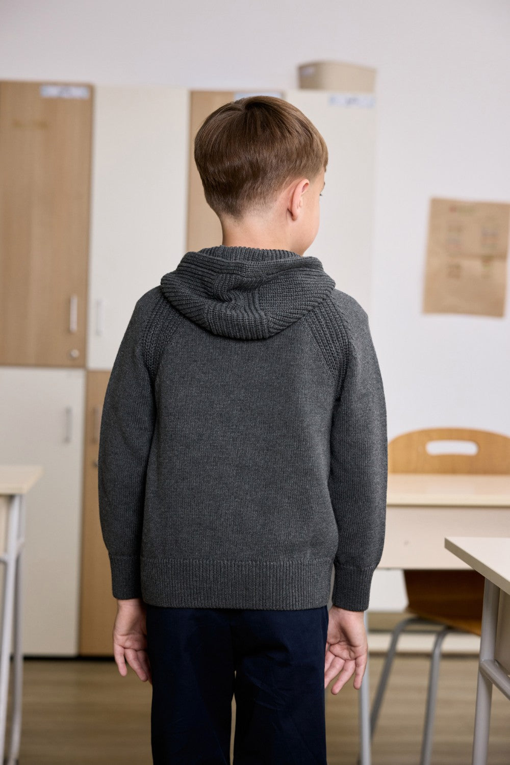 Grey unisex zip-up hoodie with ribbed texture
