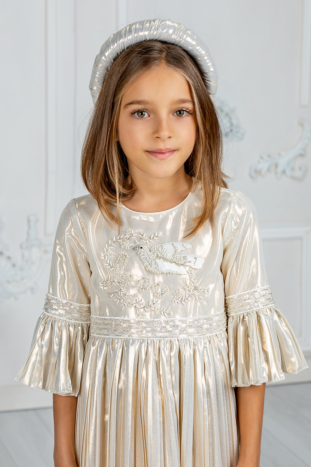 Ecru shiny dress with handmade crystal dove embellishment