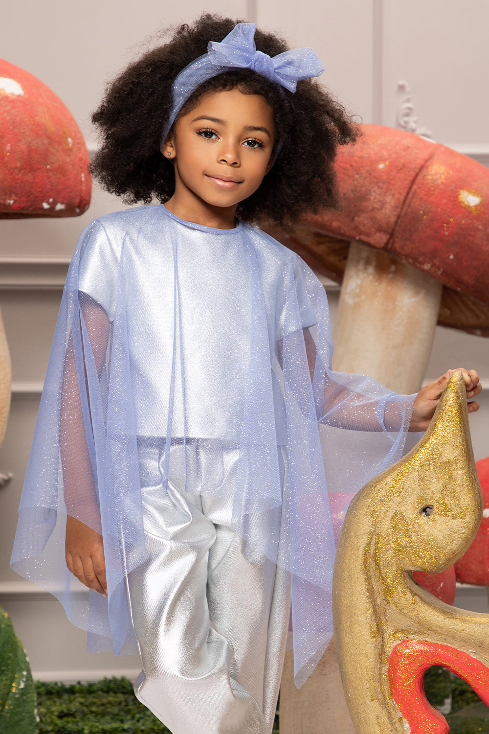 Blue shimmering tulle cape