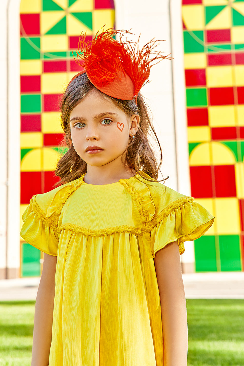Bright yellow flare dress with matching trimming