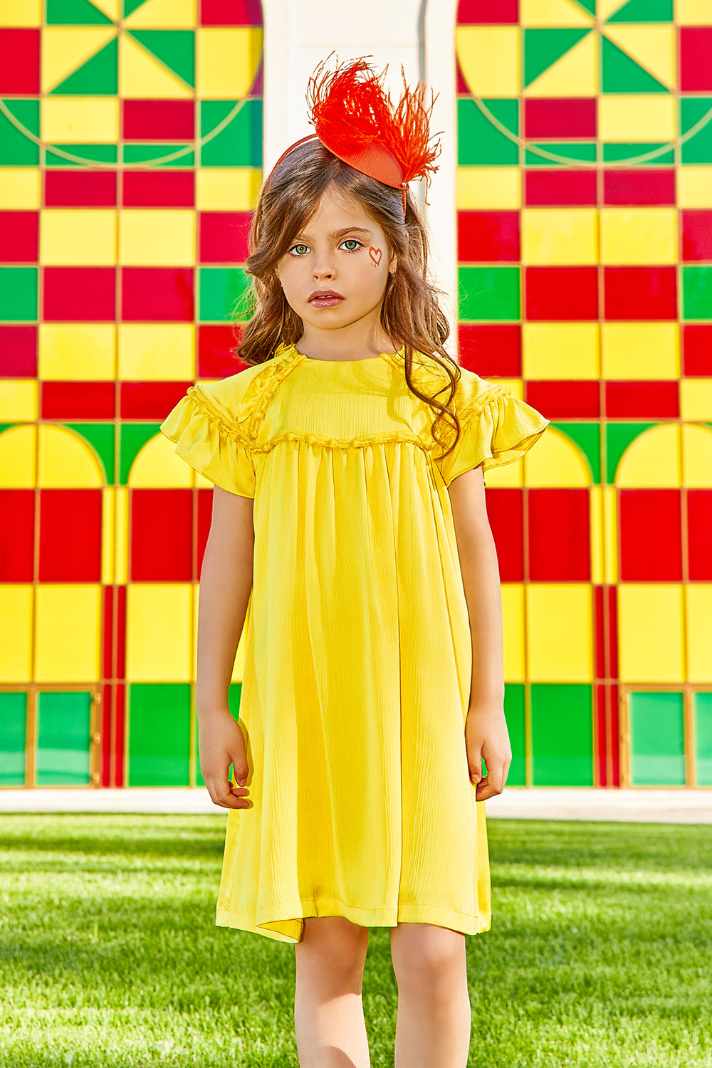 Bright yellow flare dress with matching trimming