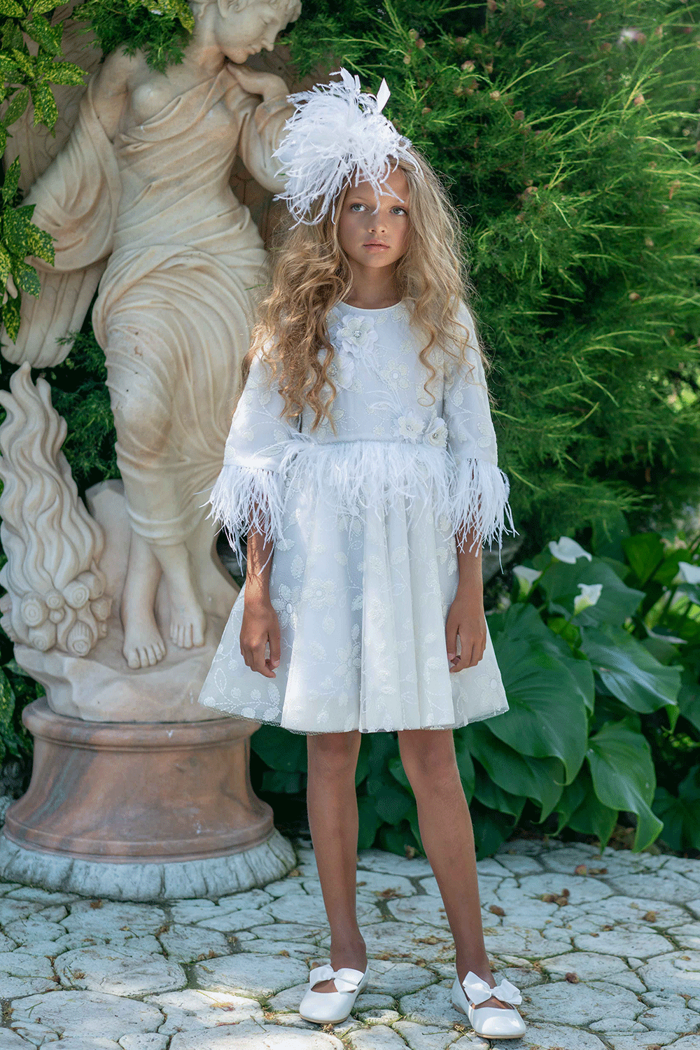 White glitter floral lace dress with feathers and hand-made embellishments
