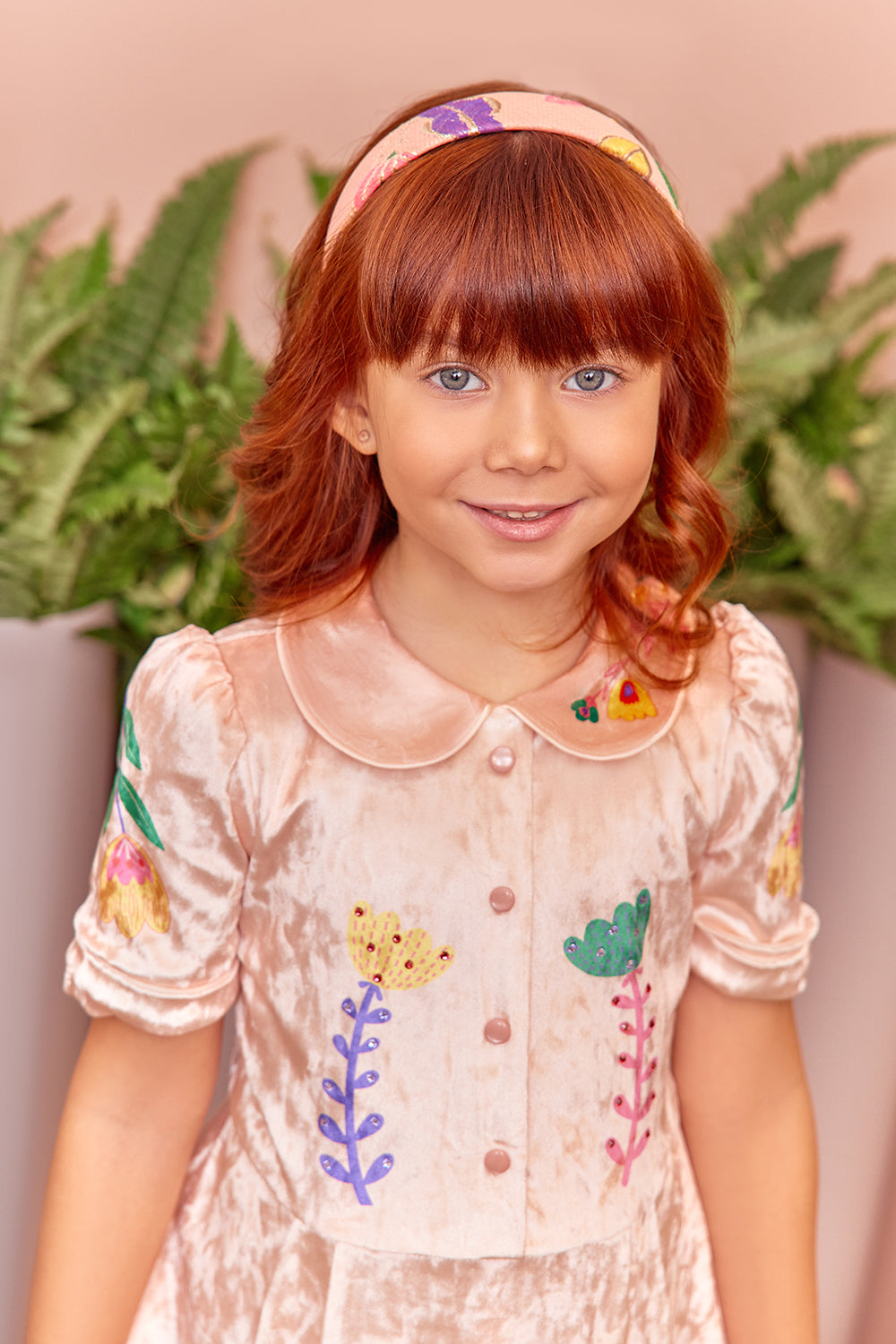 Light pink velvet dress with floral print and crystals embellishments