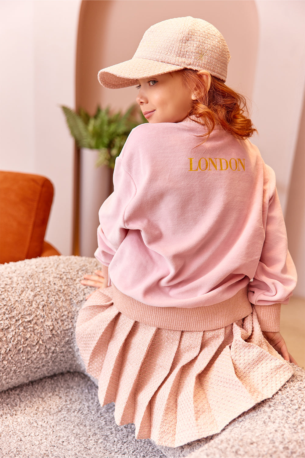 Pink cotton velvet sweatshirt with logo, print and side buttons