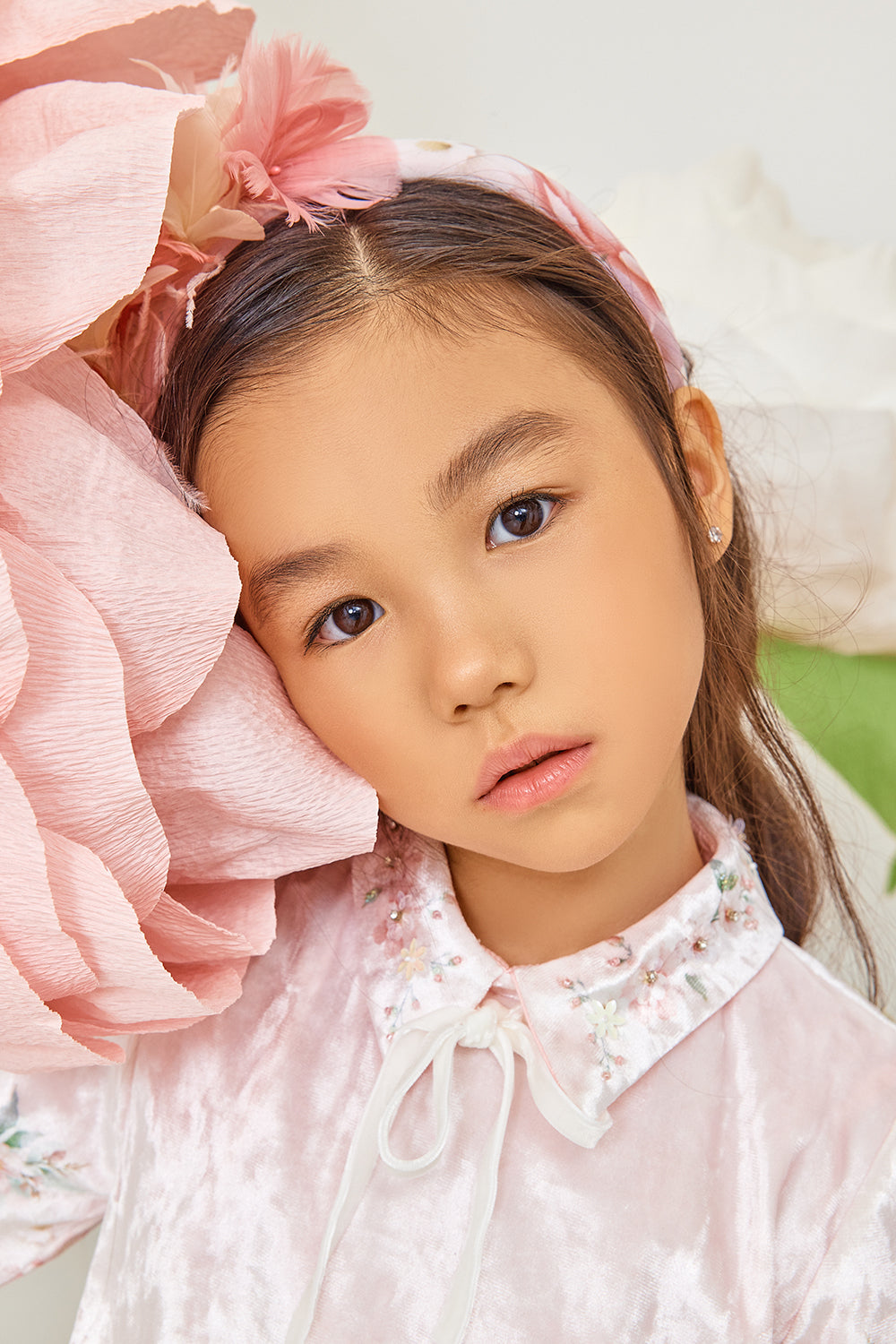 Light pink velvet dress with floral print and velvet bow