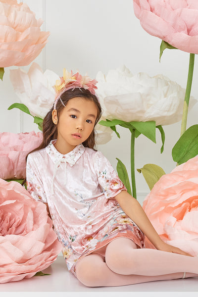 Light pink velvet dress with floral print and velvet bow