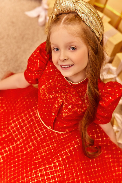 Red and gold tulle layered dress with pussy bow