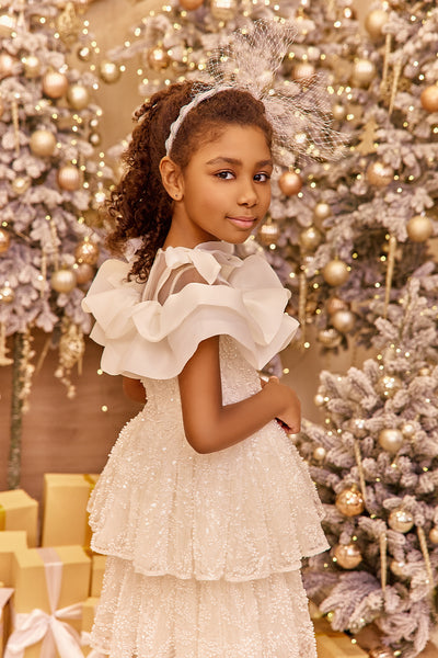 White pearl lace dress with organza frills and shoulder bows