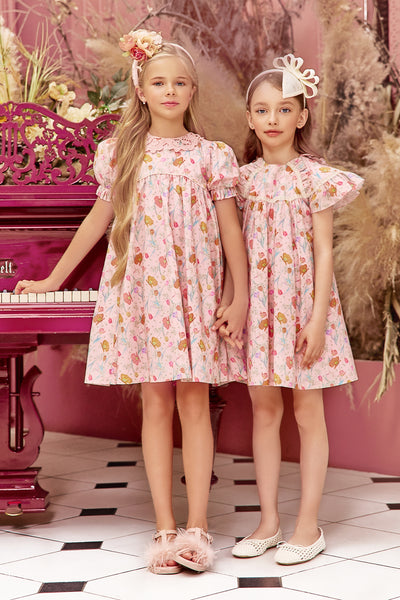 Light pink cotton botanical flowers Liberty print dress with frilled sleeves