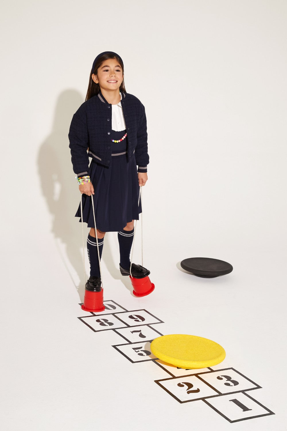 Blue jersey top with white front detail and collar