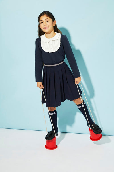 Blue jersey top with white front detail and collar