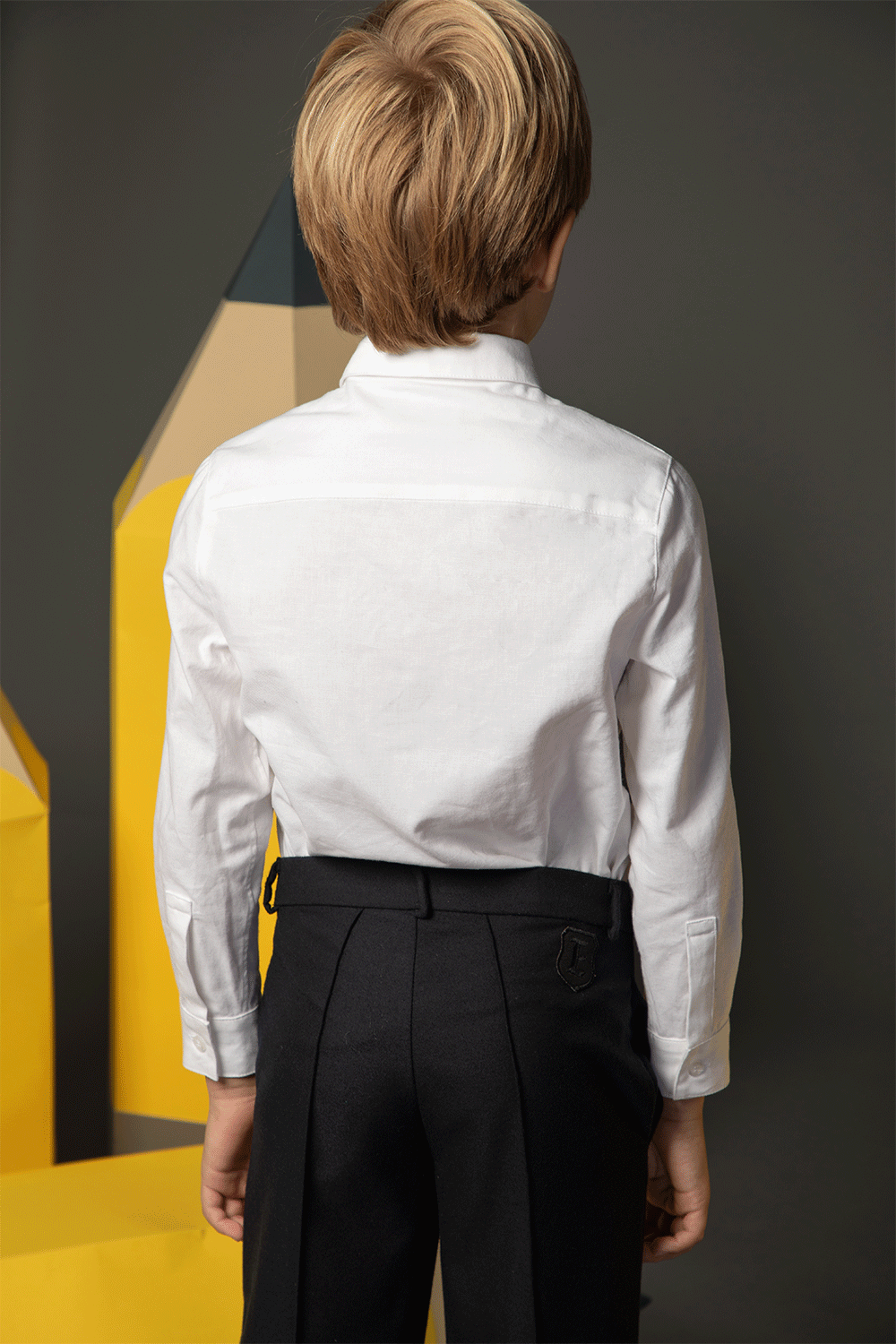 Classic navy pleated trousers