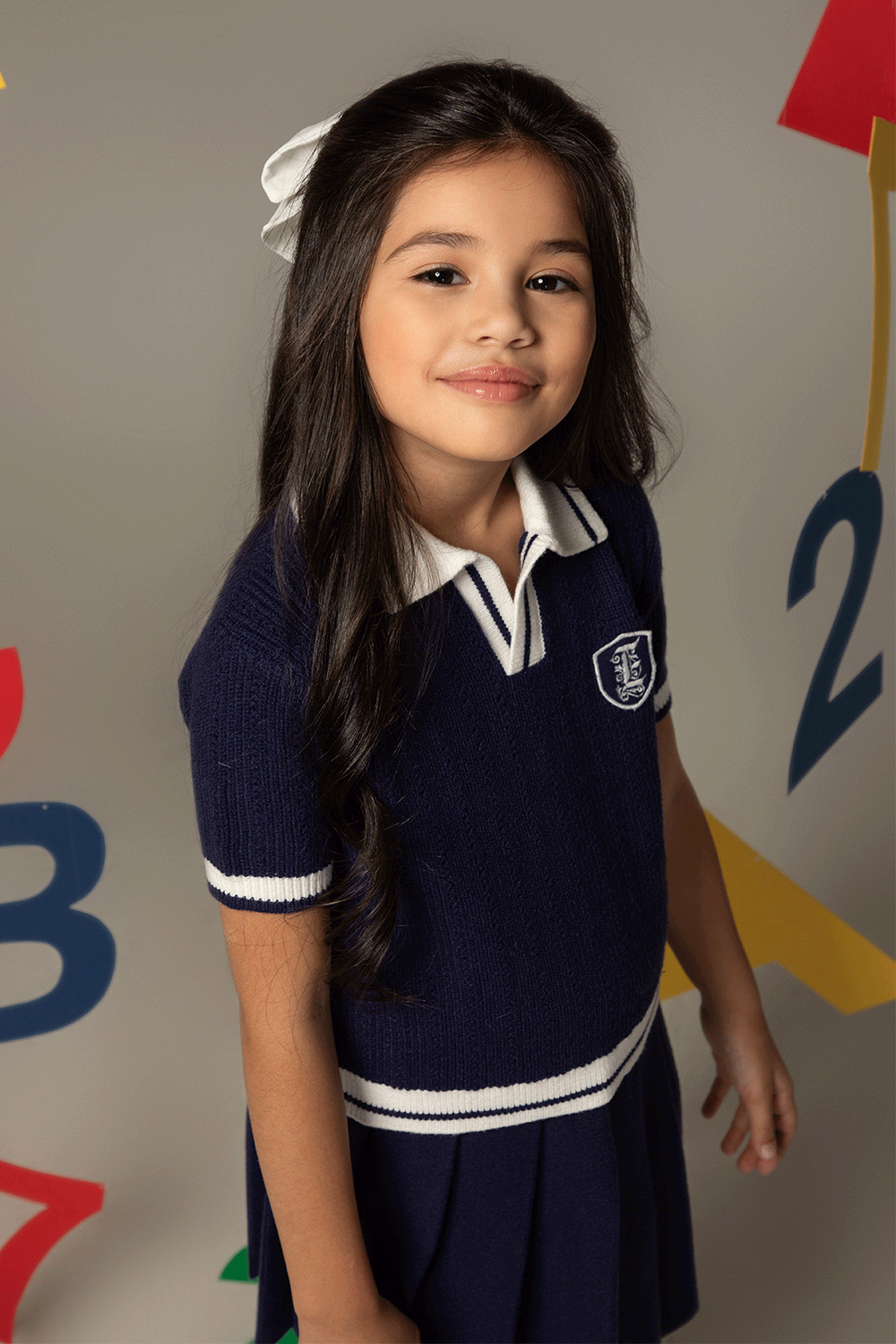 Navy knitted top with contrasting details