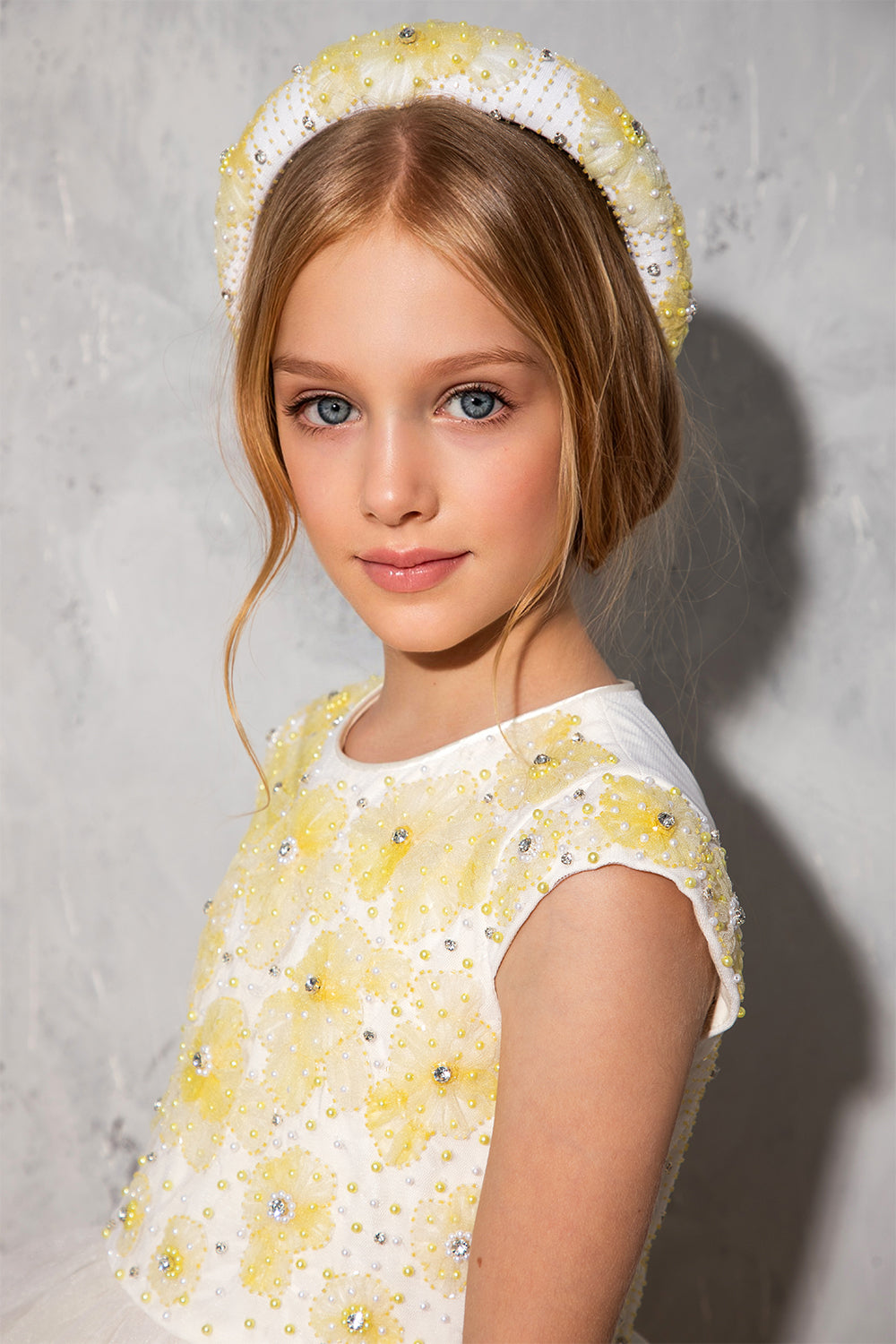 White and yellow ombré layered tulle dress with hand-embellished yellow flower top