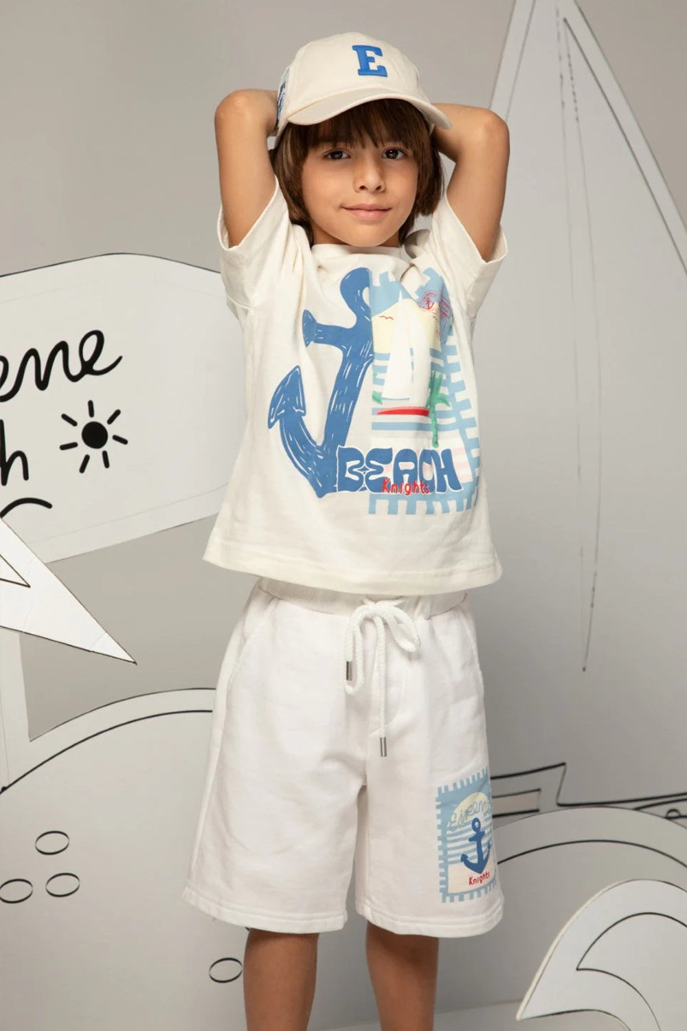 Off-white drawstring shorts with anchor print and back logo detail
