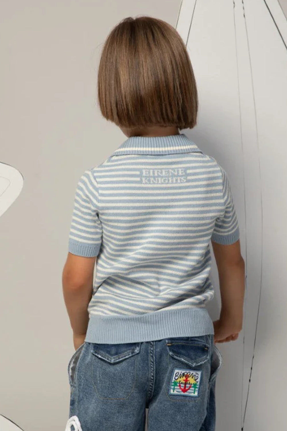 Light blue and white striped knit shirt with a sailor collar and short sleeves