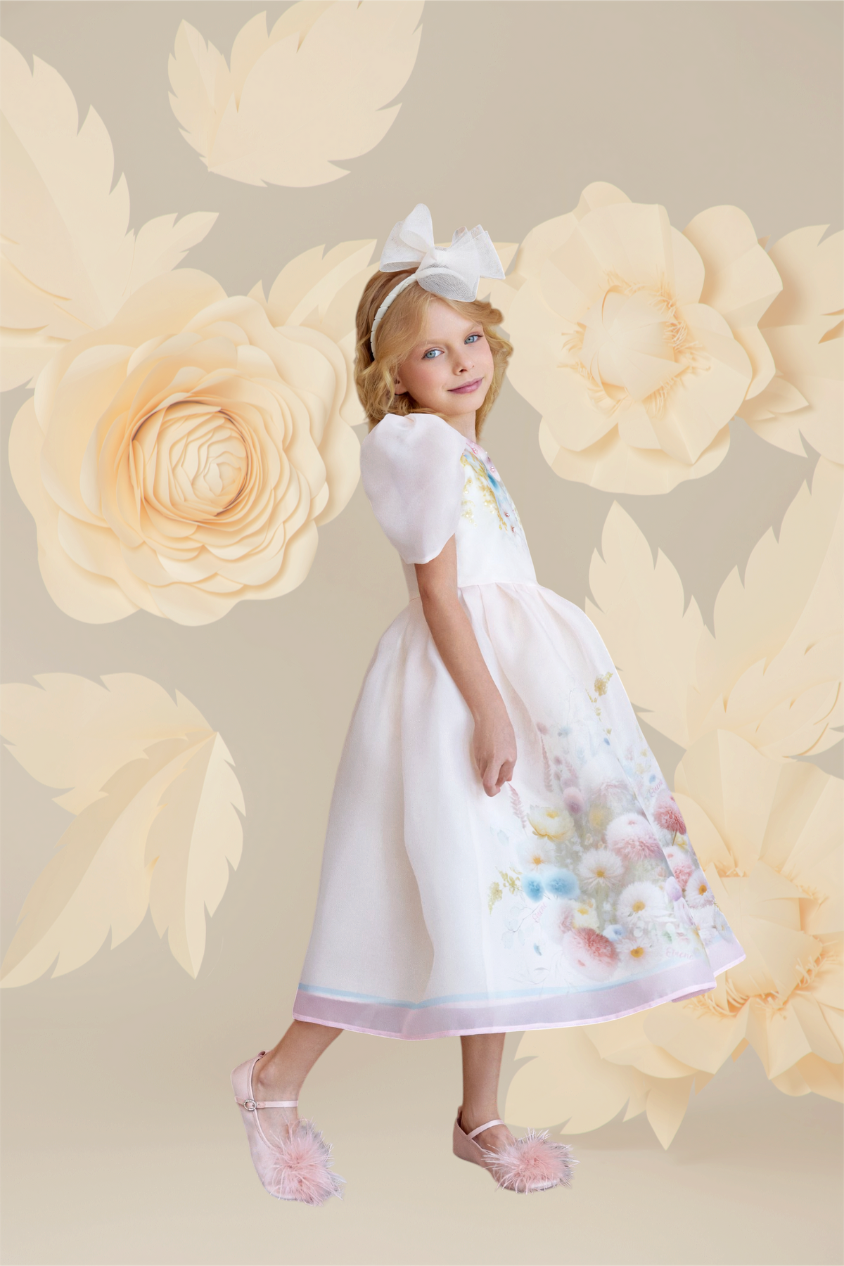 Light peach floral organza dress with puff sleeves and hand-made embellishments