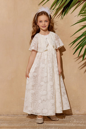 Off-white floral lace dress with flutter sleeves and cape, shimmering bow