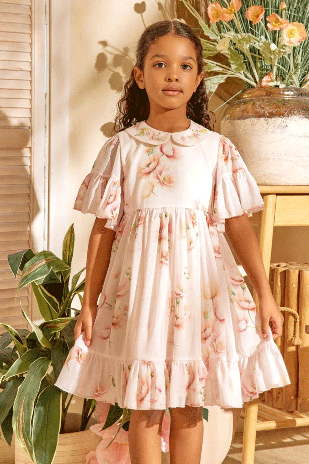 Chiffon shimmering floral dress with flutter sleeves, ruffled hem, and hand-embroidered peter pan collar