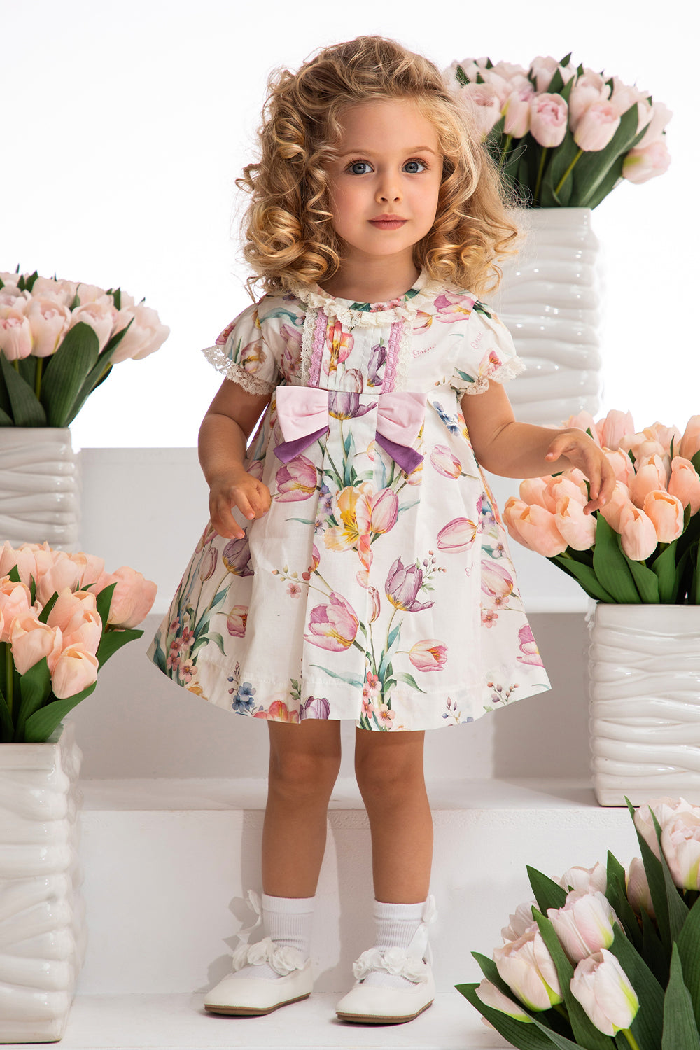 Satin cotton tulip print baby dress with pink and purple bows with matching knickers