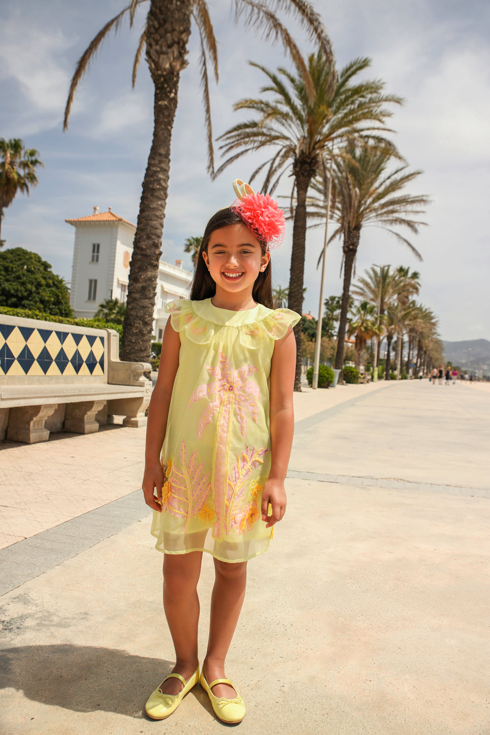 Yellow organza dress with hand appliqué of embellished pink palms, flowers and birds