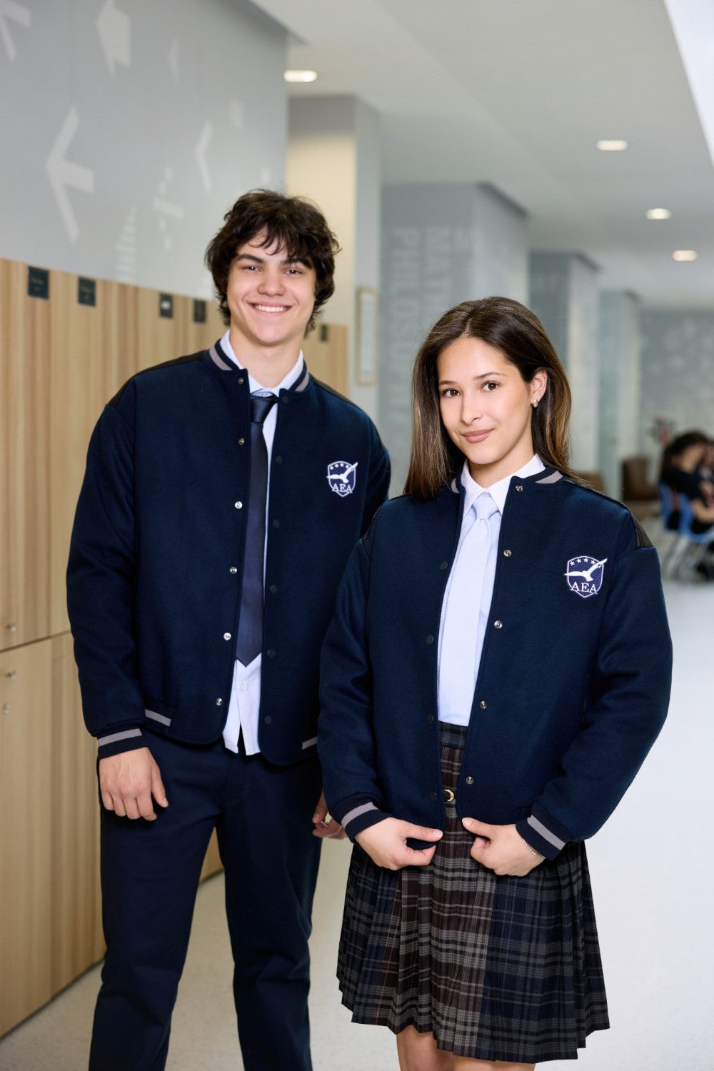 Navy bomber jacket for teen girls with logo