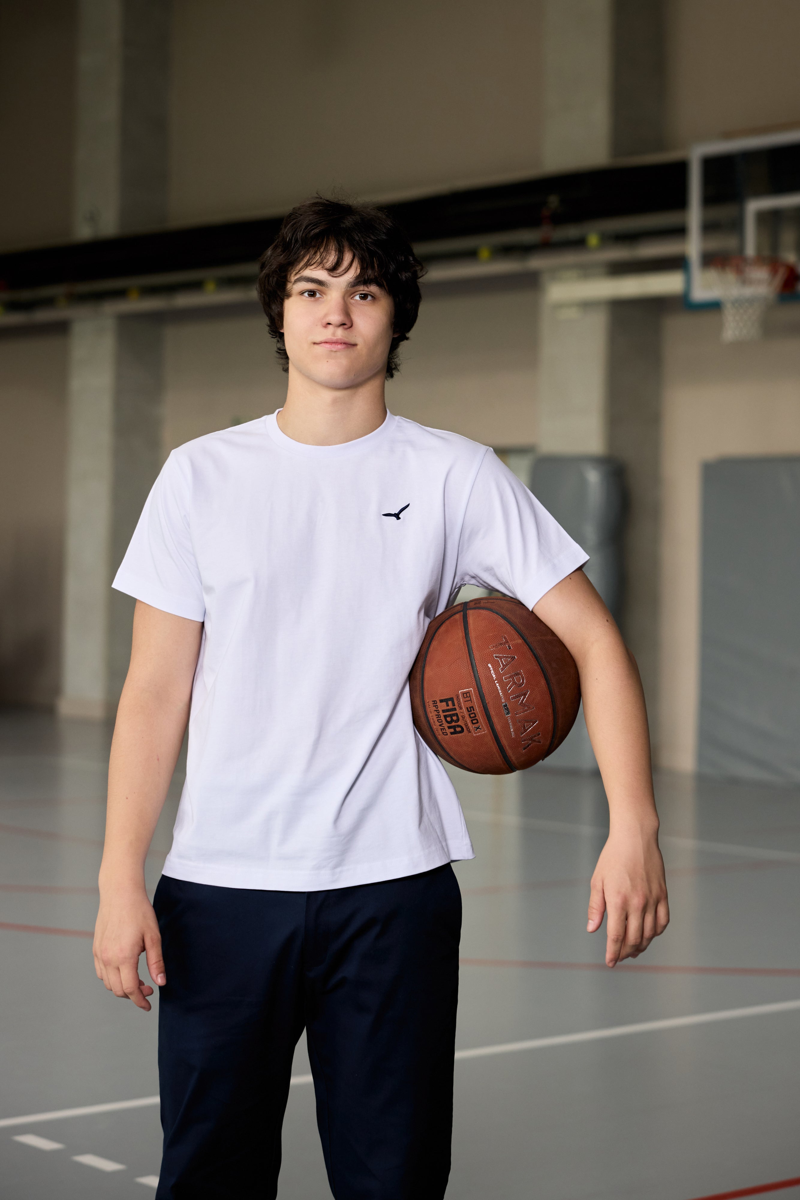 White cotton t-shirt for teen boys with AEA logo