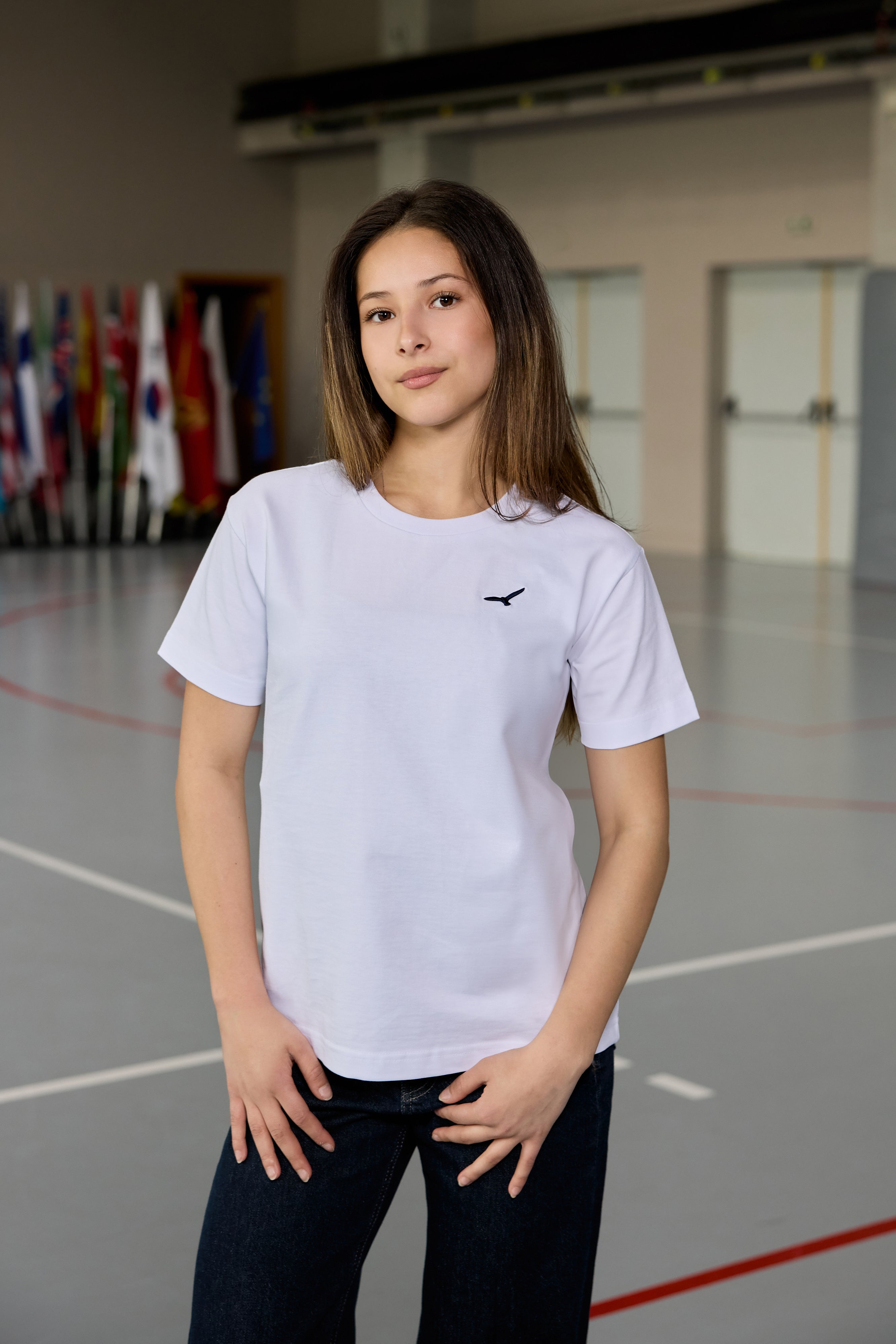 White cotton t-shirt for teen girls with AEA logo