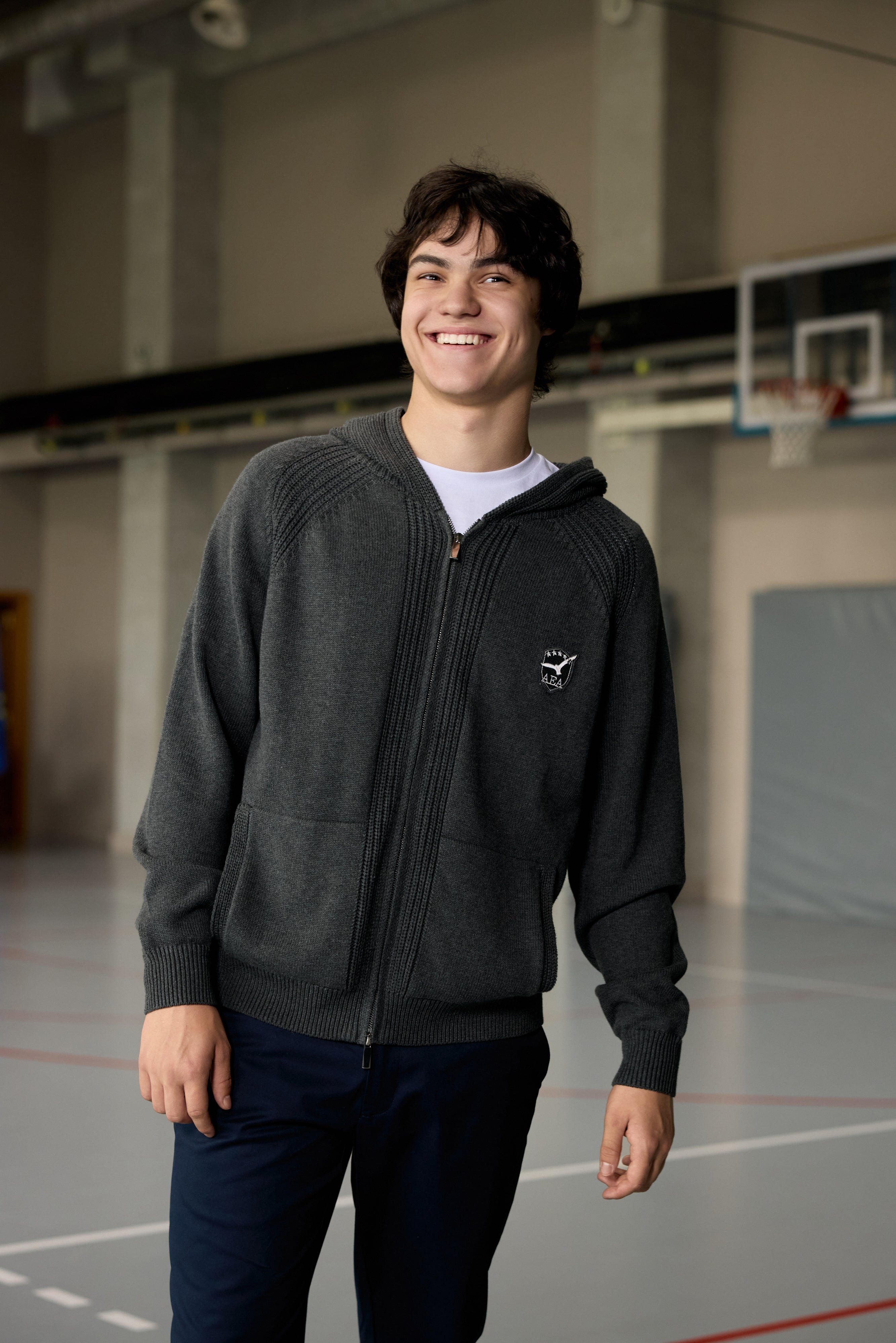 Unisex grey zip-up hoodie with ribbed texture