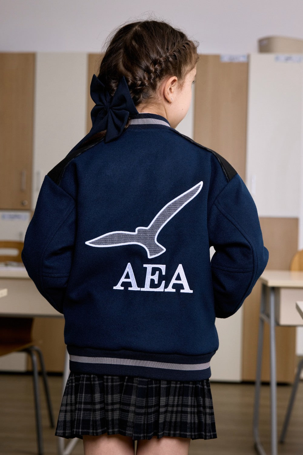 Navy bomber jacket for little girls with logo