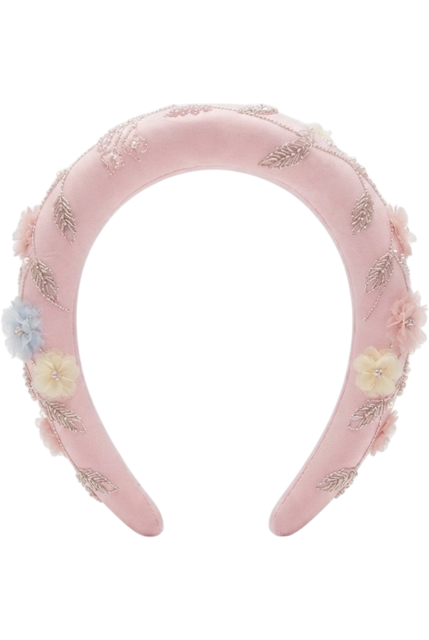 Pink padded hairband with hand-embellishments of floral and leaf motifs - product view