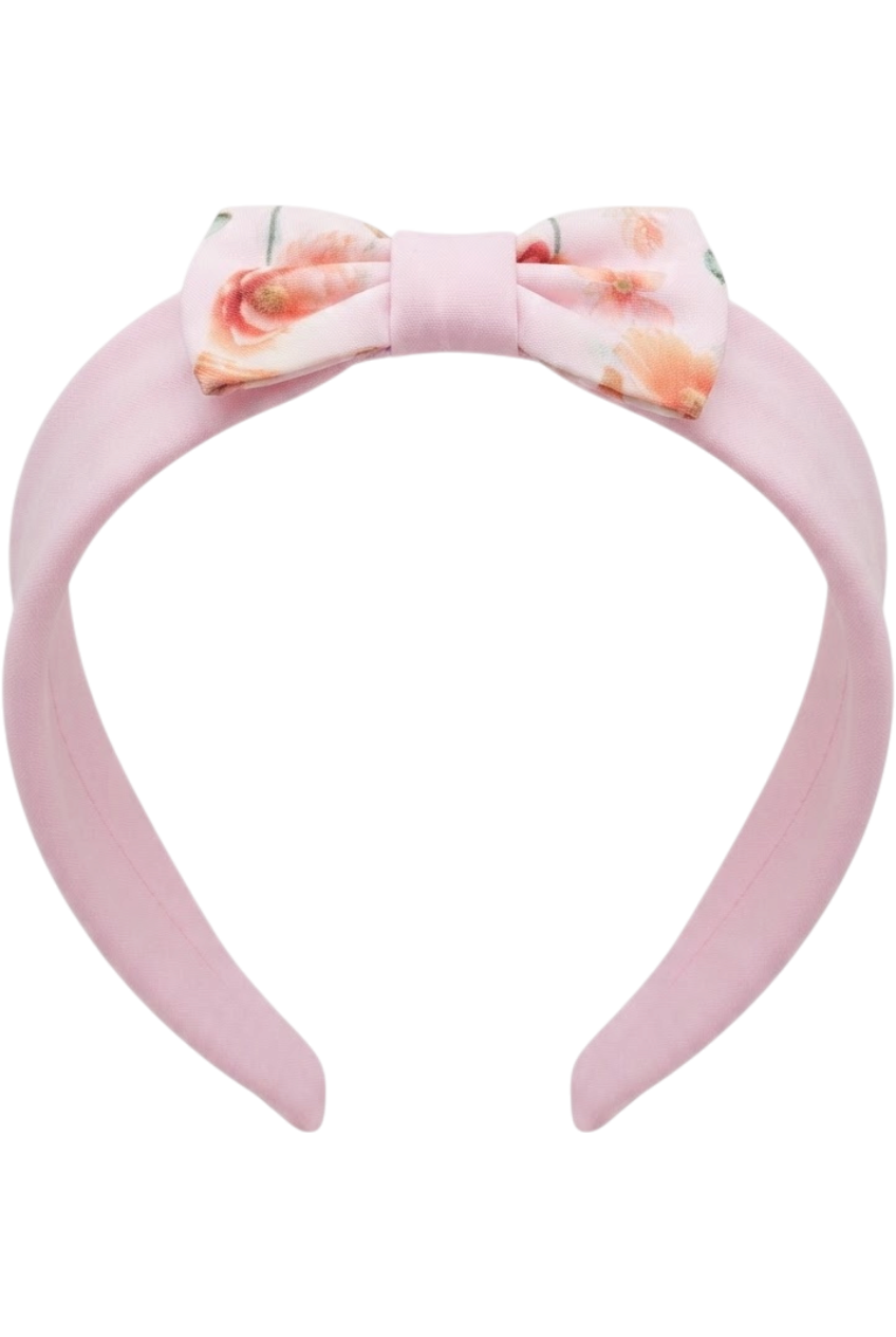 Soft pink headband with a charming bow, featuring delicate floral prints - product view