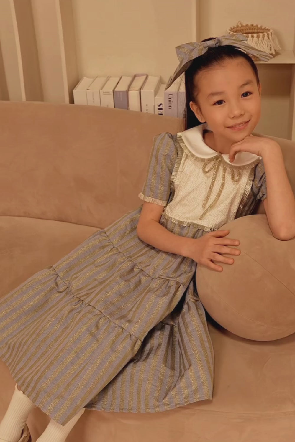 Denim and gold striped dress with white collar and gold details