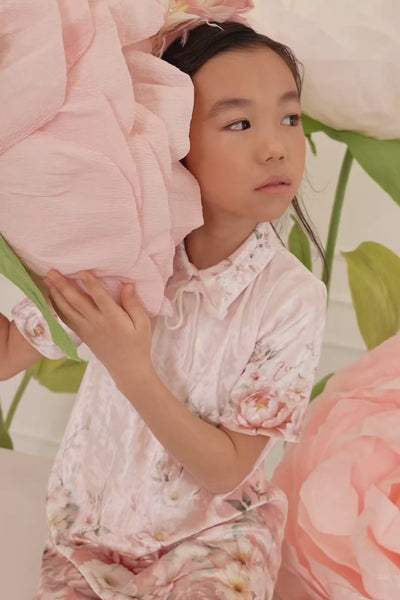 Light pink velvet dress with floral print and velvet bow